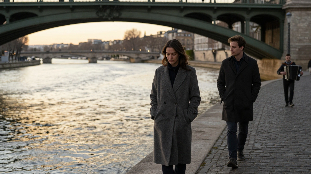 A couple walking silently across a Paris bridge at golden hour, the Seine shimmering below.
